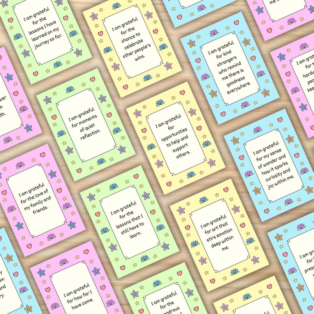 Gratitude affirmation cards with hand-drawn motifs of flowers, hearts, and stars